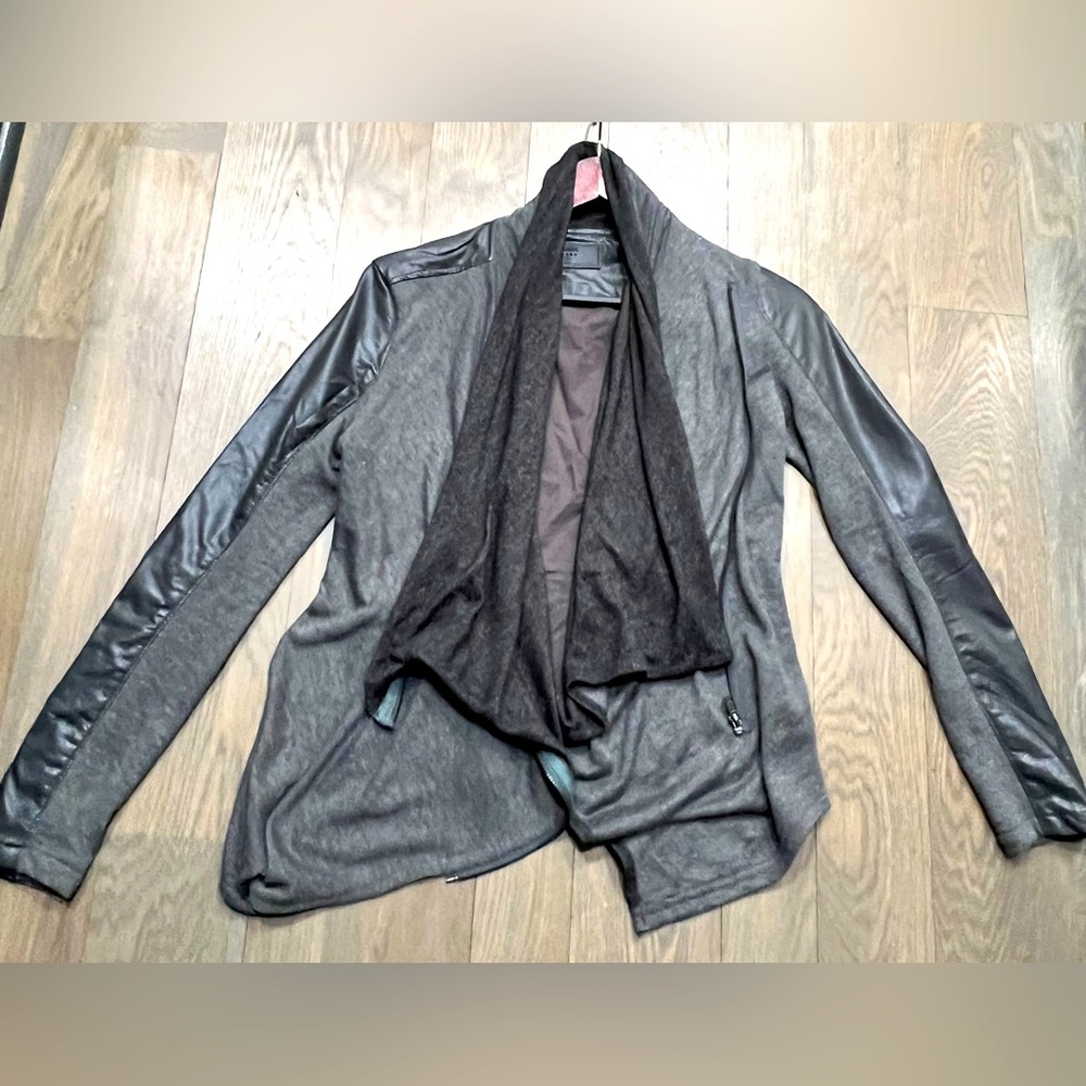 Super cute ☺️ jacket.Looks great w/jeans!Grey cotton/poly w/ faux grey leather.
